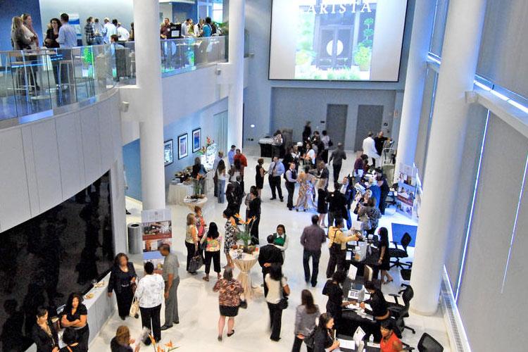 Attendees attending a conference at the GLC